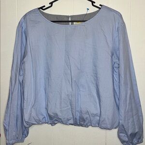 Maeve light blue long-sleeved blouse with a smocked hem PTP 22